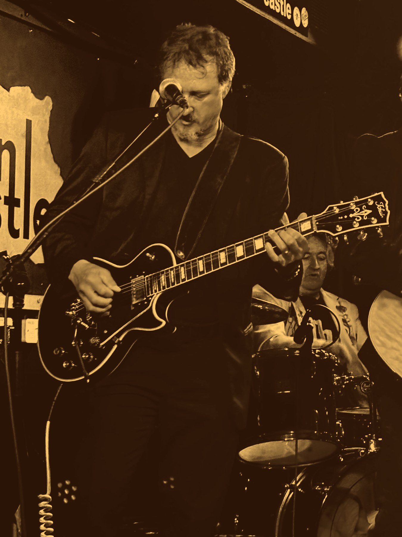 Dave Mason playing electric guitar