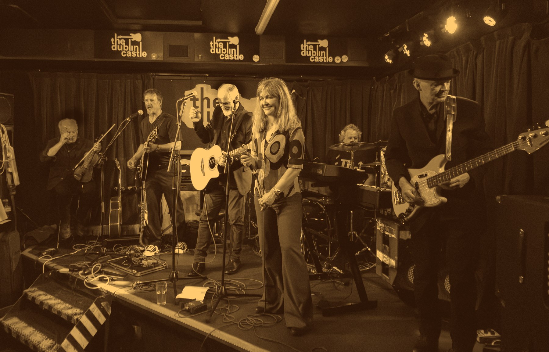 Raincatchers performing live on stage