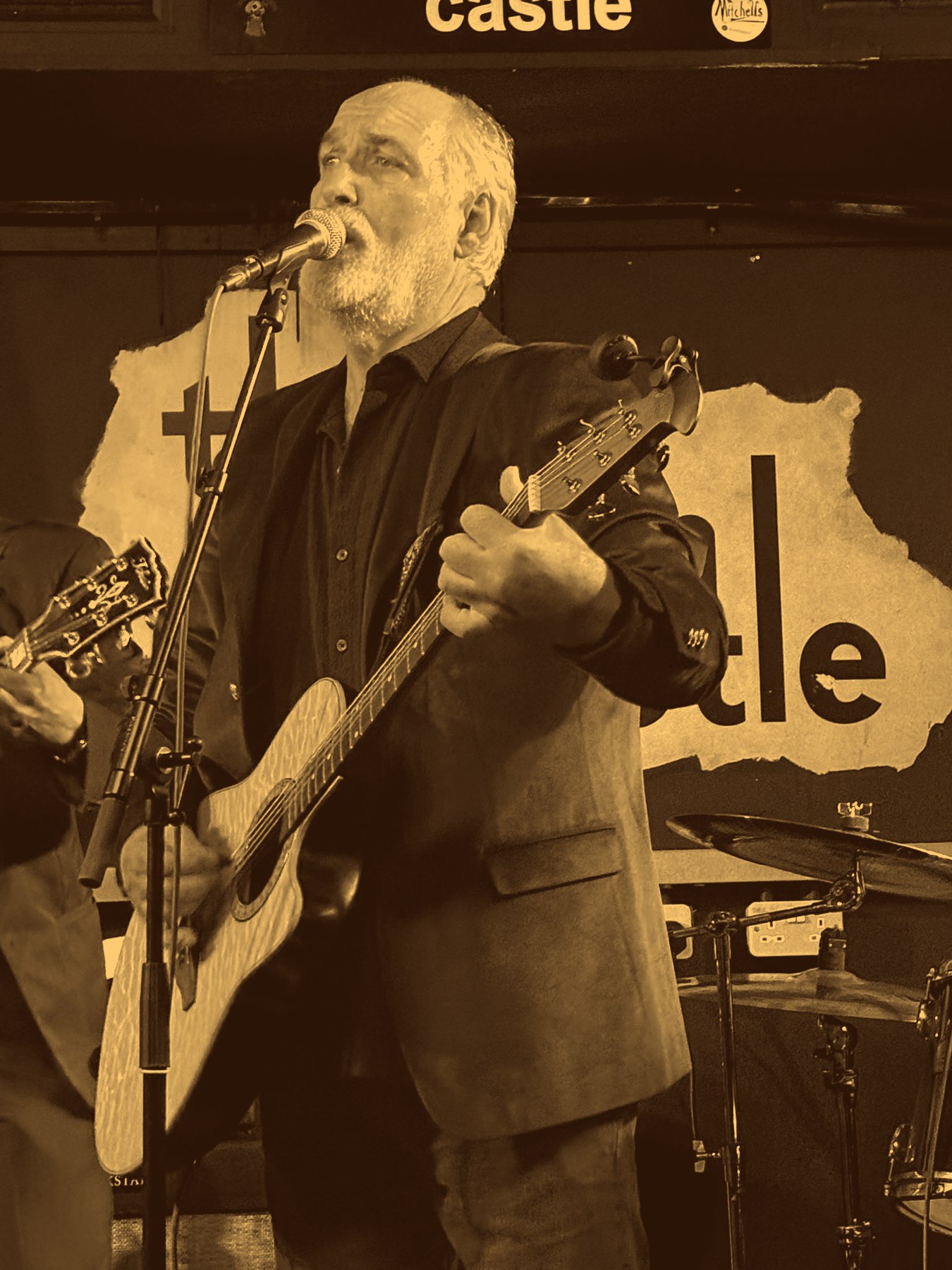 Mike Morton singing and playing guitar